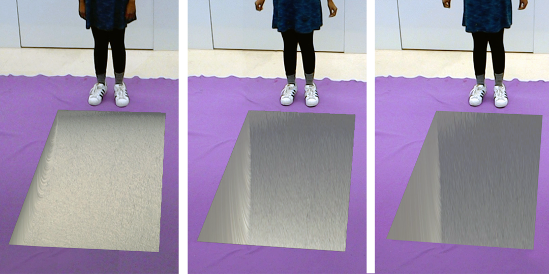 A woman stands at the edge of three virtual gaps presented by the Microsoft HoloLens. The leftmost gap is 0.25m deep. The center gap is 1.0m deep. And the third gap is 1.5m deep.